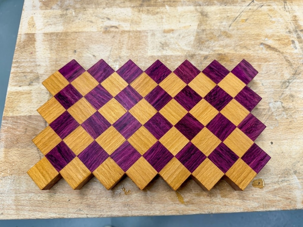 Handcrafted Beech and Purpleheart diagonal grid cutting board