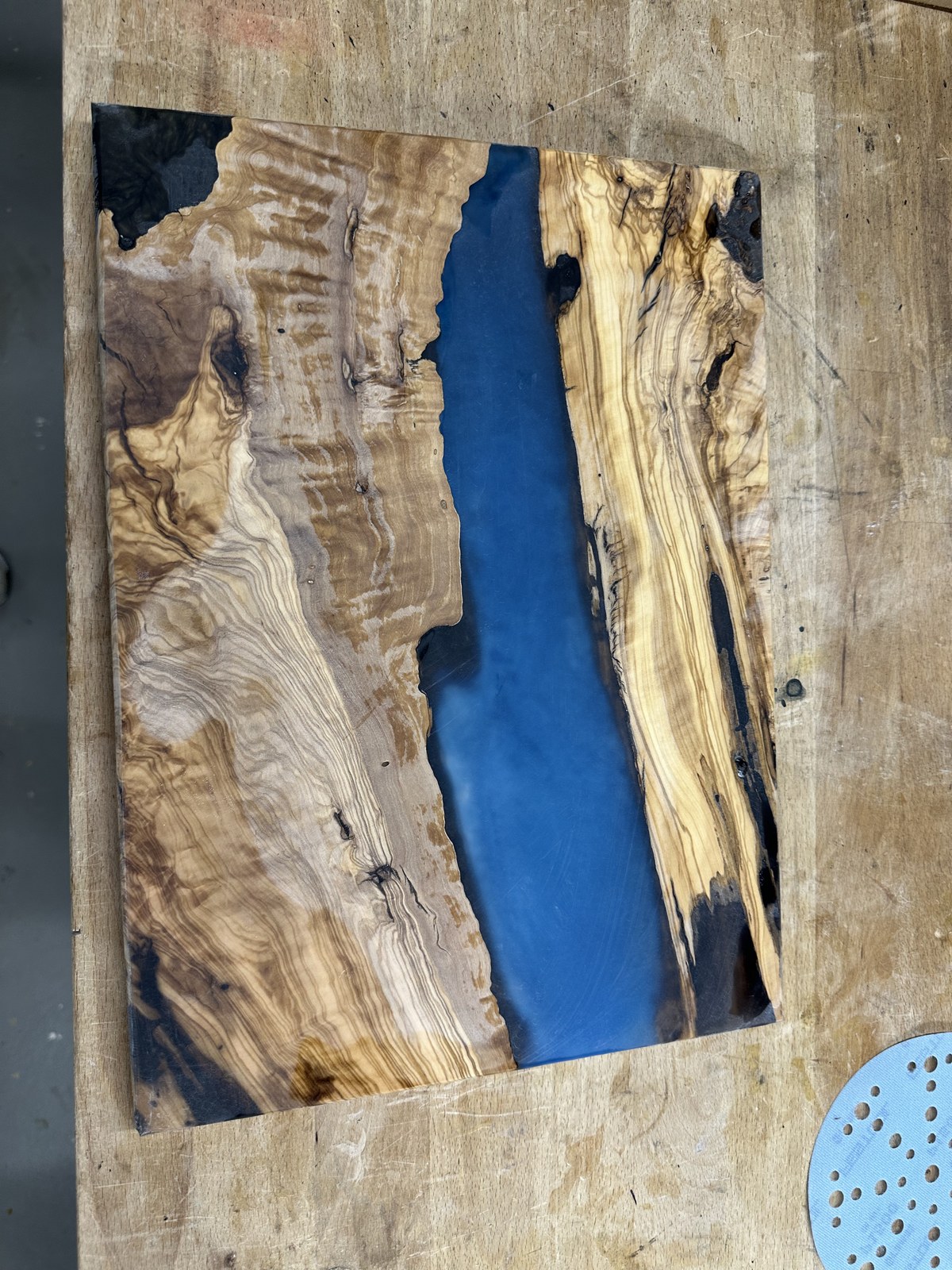 Machine compounding and polishing the epoxy river