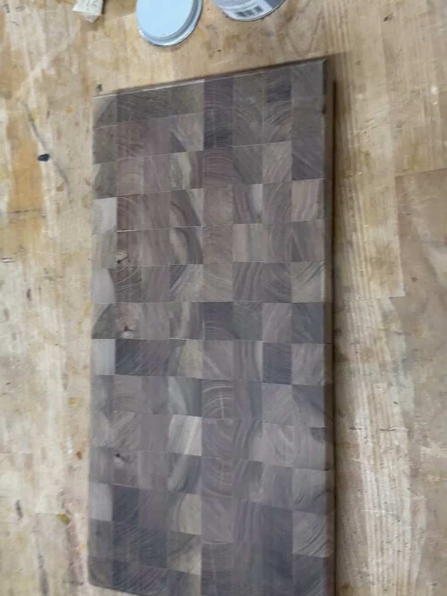 Raw dry sanded walnut end-grain board before oil application